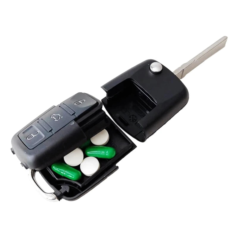 Clé de voiture factice avec compartiment secret.          مفتاح سيارة مزيف مع مخزن سري